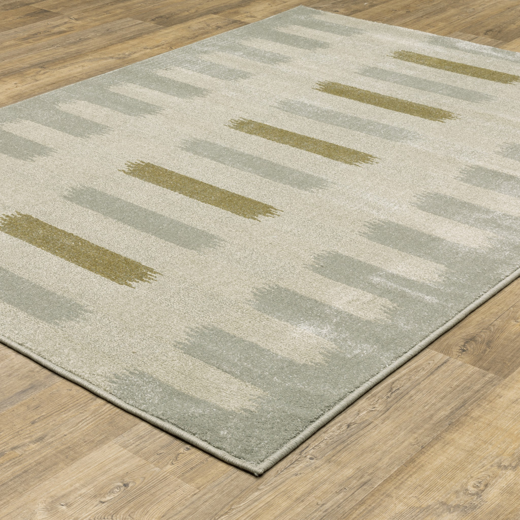 3" X 5" Beige Grey Gold And Green Geometric Power Loom Stain Resistant Area Rug