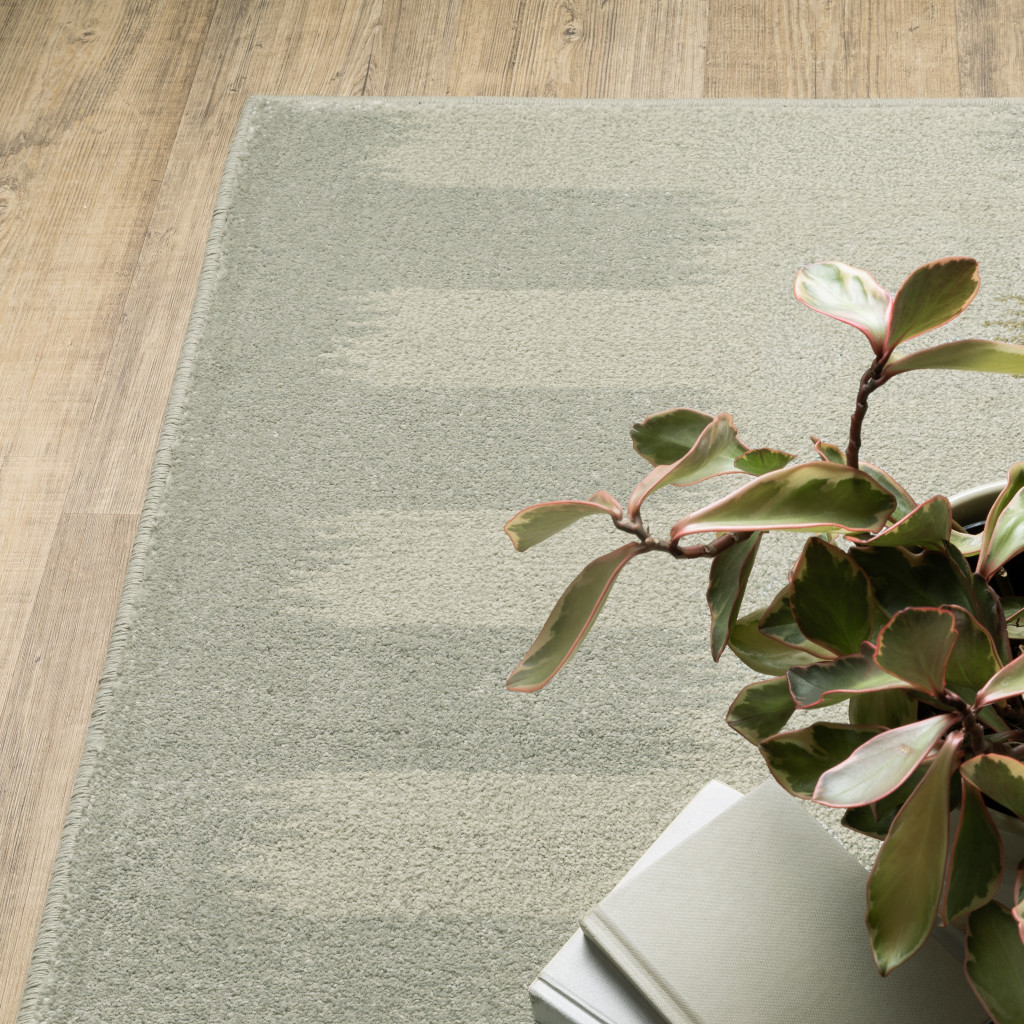 3" X 5" Beige Grey Gold And Green Geometric Power Loom Stain Resistant Area Rug
