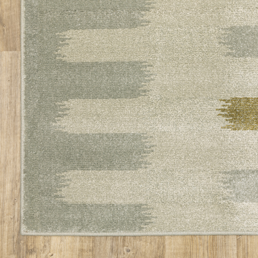 3" X 5" Beige Grey Gold And Green Geometric Power Loom Stain Resistant Area Rug