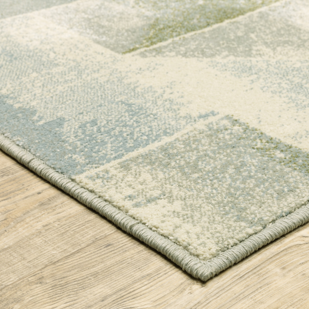 3" X 5" Blue Green Grey Gold And Ivory Geometric Power Loom Stain Resistant Area Rug