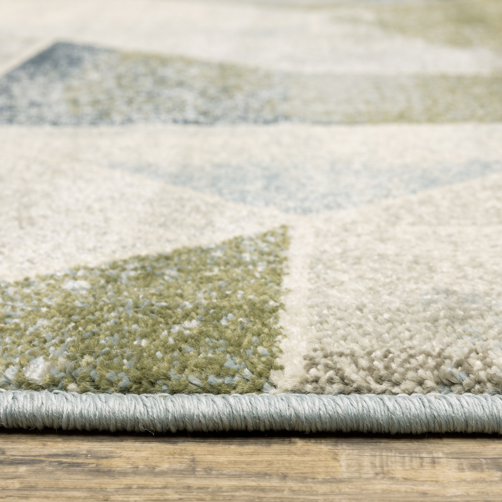3" X 5" Blue Green Grey Gold And Ivory Geometric Power Loom Stain Resistant Area Rug
