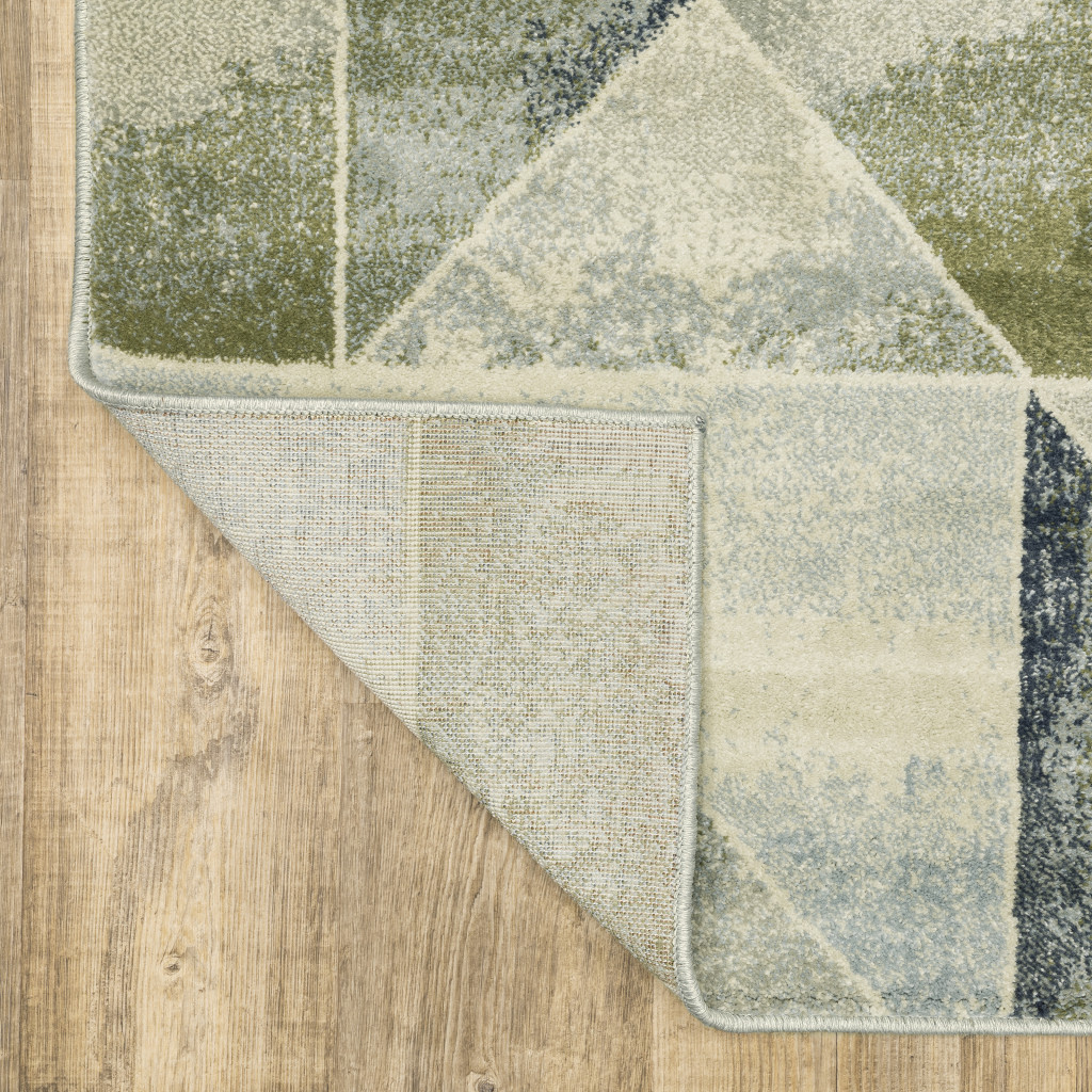 3" X 5" Blue Green Grey Gold And Ivory Geometric Power Loom Stain Resistant Area Rug
