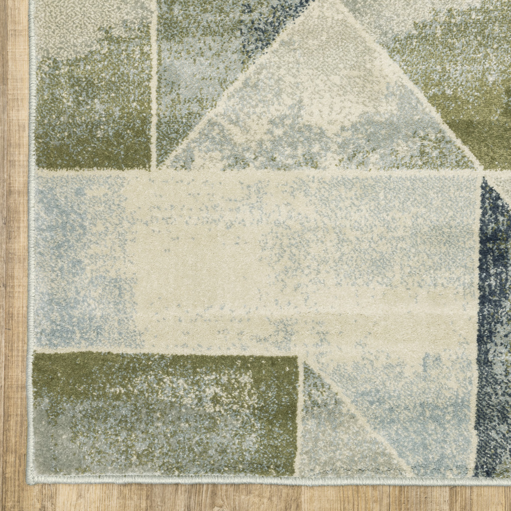 3" X 5" Blue Green Grey Gold And Ivory Geometric Power Loom Stain Resistant Area Rug