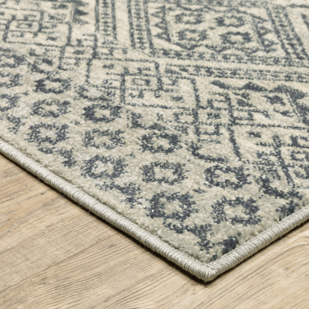 3" X 5" Blue And Beige Geometric Power Loom Stain Resistant Area Rug