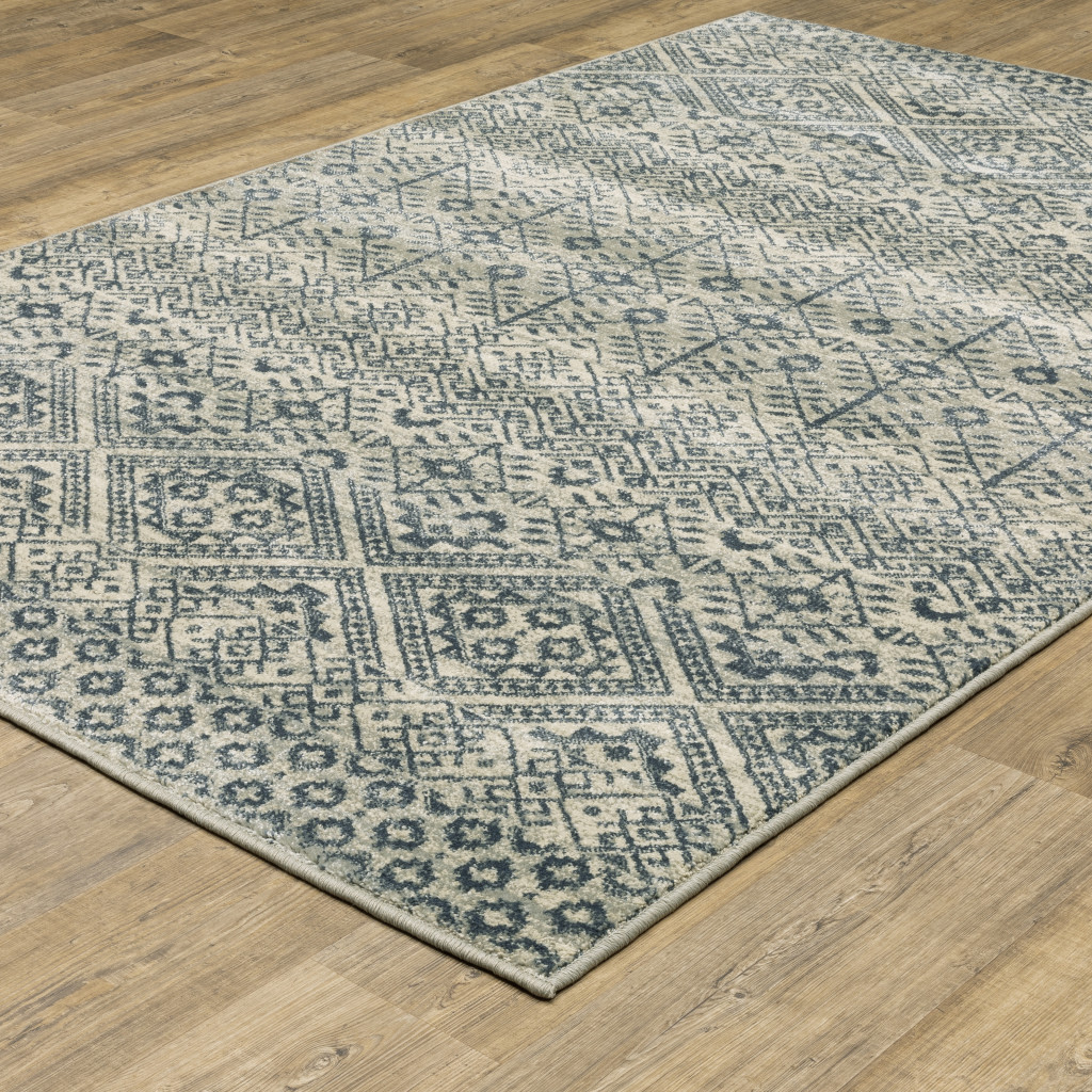 3" X 5" Blue And Beige Geometric Power Loom Stain Resistant Area Rug