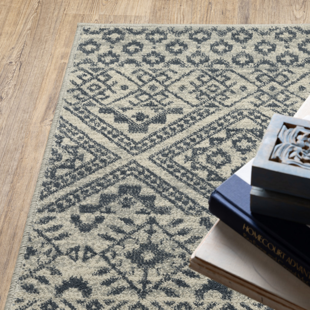 3" X 5" Blue And Beige Geometric Power Loom Stain Resistant Area Rug
