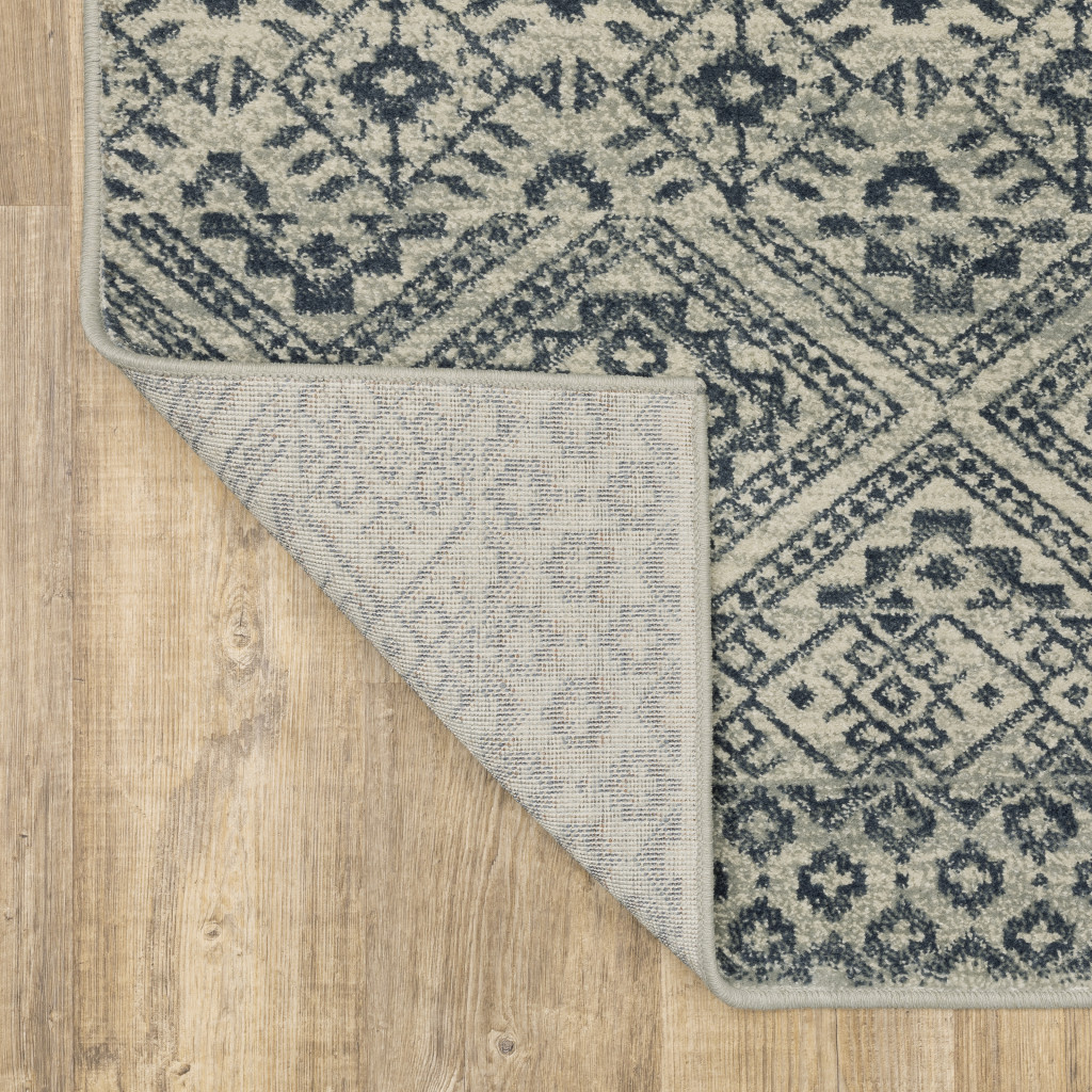 3" X 5" Blue And Beige Geometric Power Loom Stain Resistant Area Rug