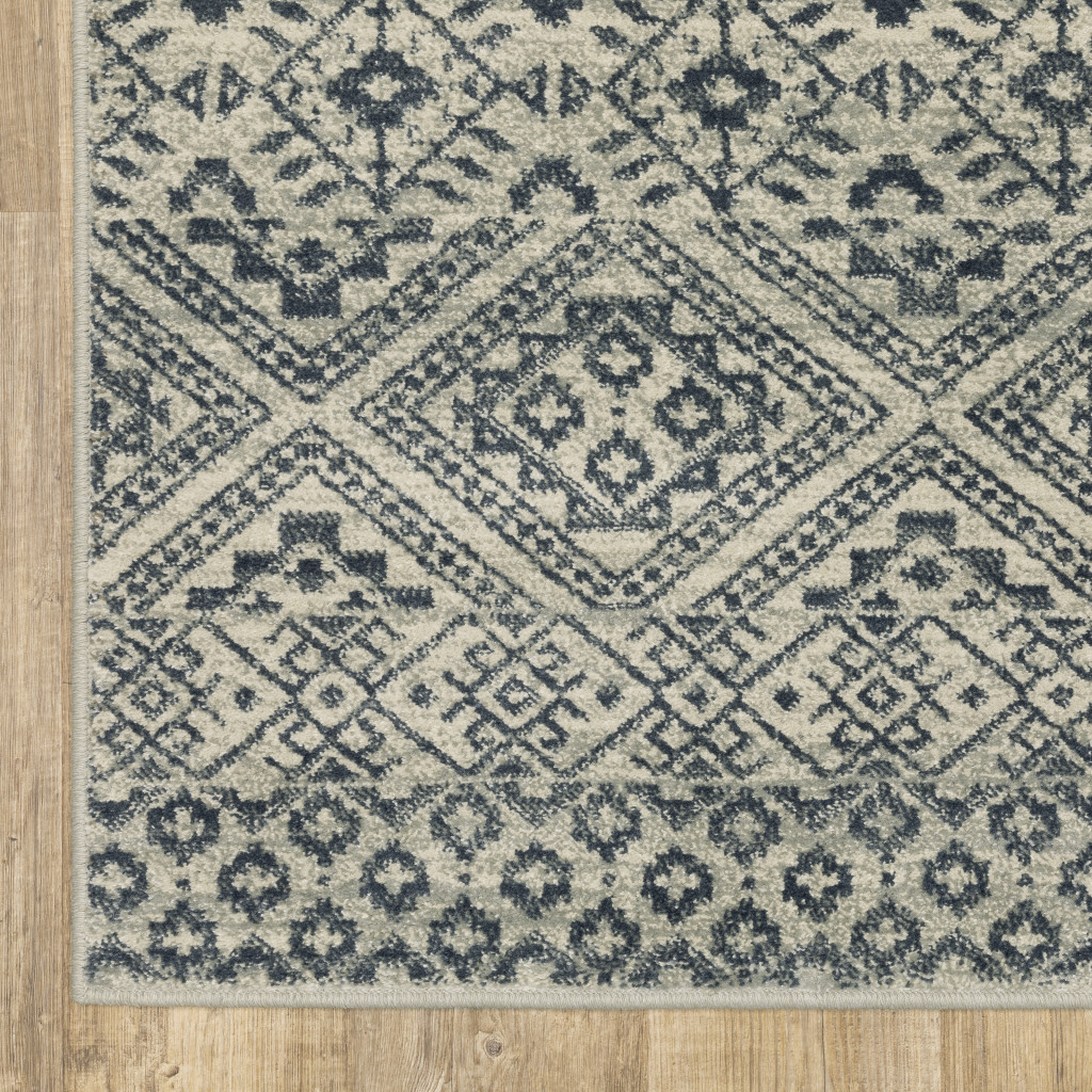 3" X 5" Blue And Beige Geometric Power Loom Stain Resistant Area Rug