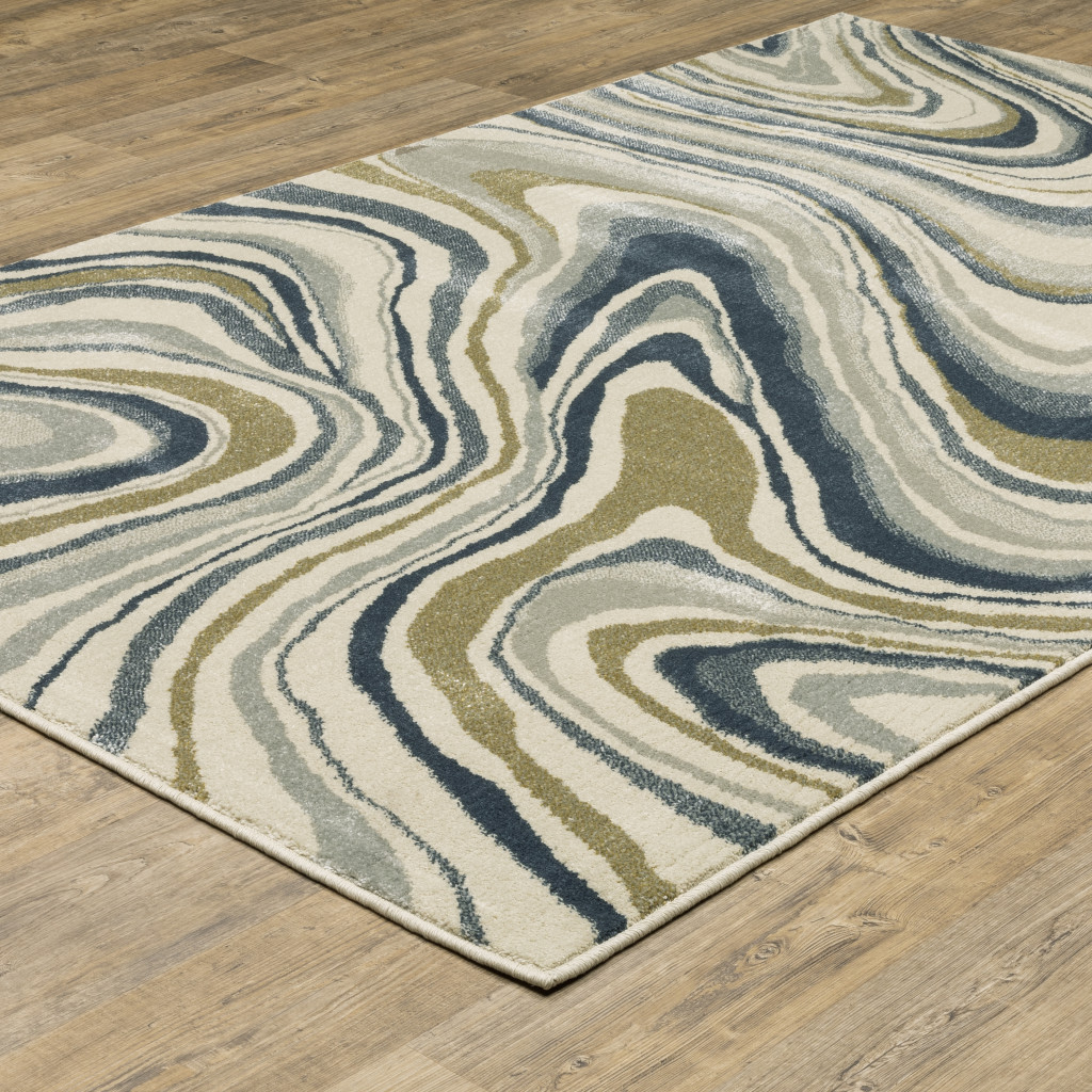 8" X 10" Ivory Blue And Beige Abstract Power Loom Stain Resistant Area Rug