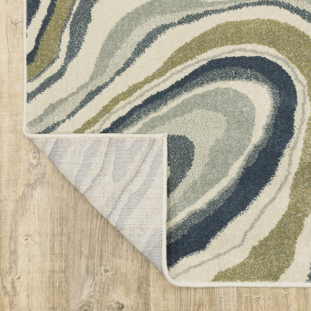 10" X 13" Ivory Blue And Beige Abstract Power Loom Stain Resistant Area Rug