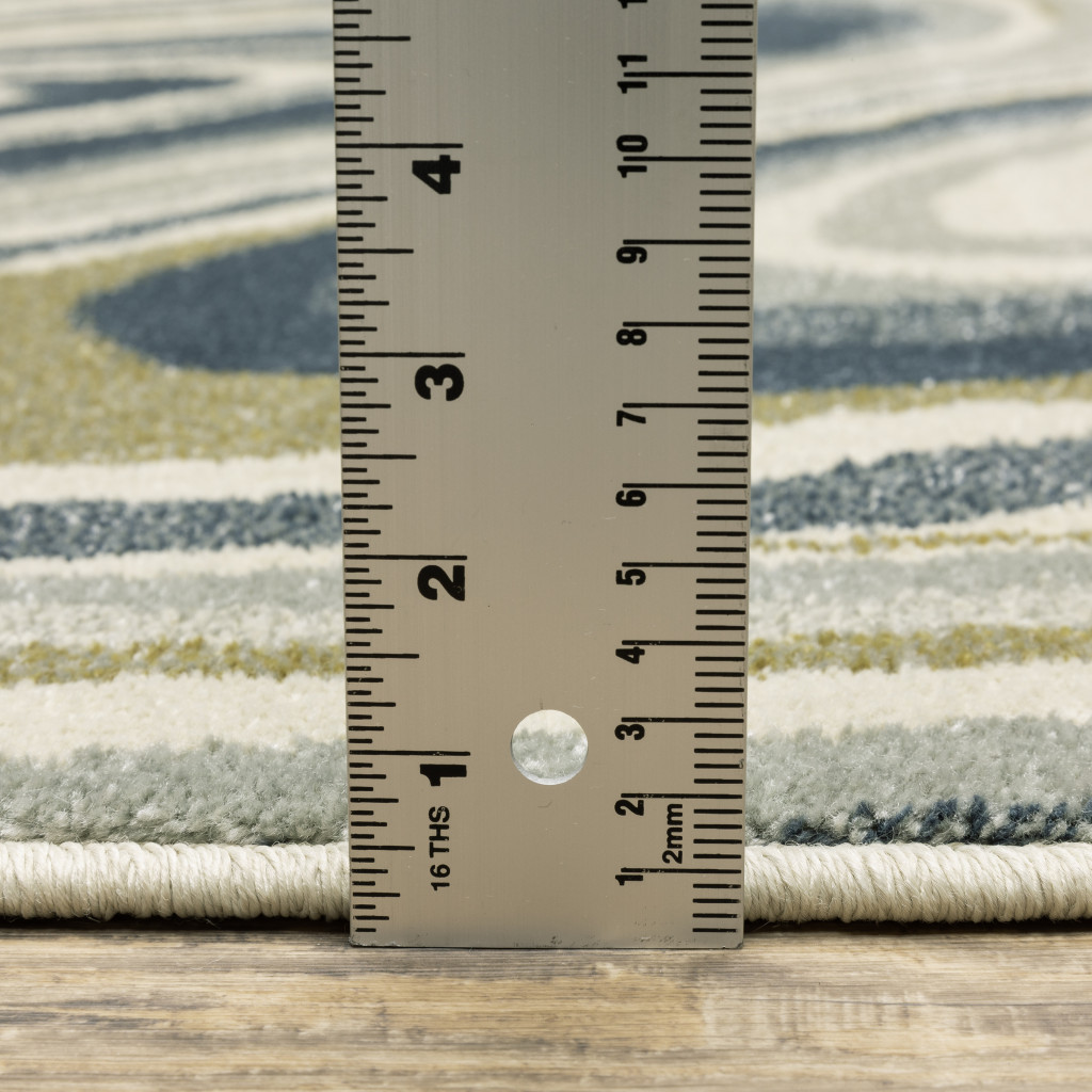 10" X 13" Ivory Blue And Beige Abstract Power Loom Stain Resistant Area Rug