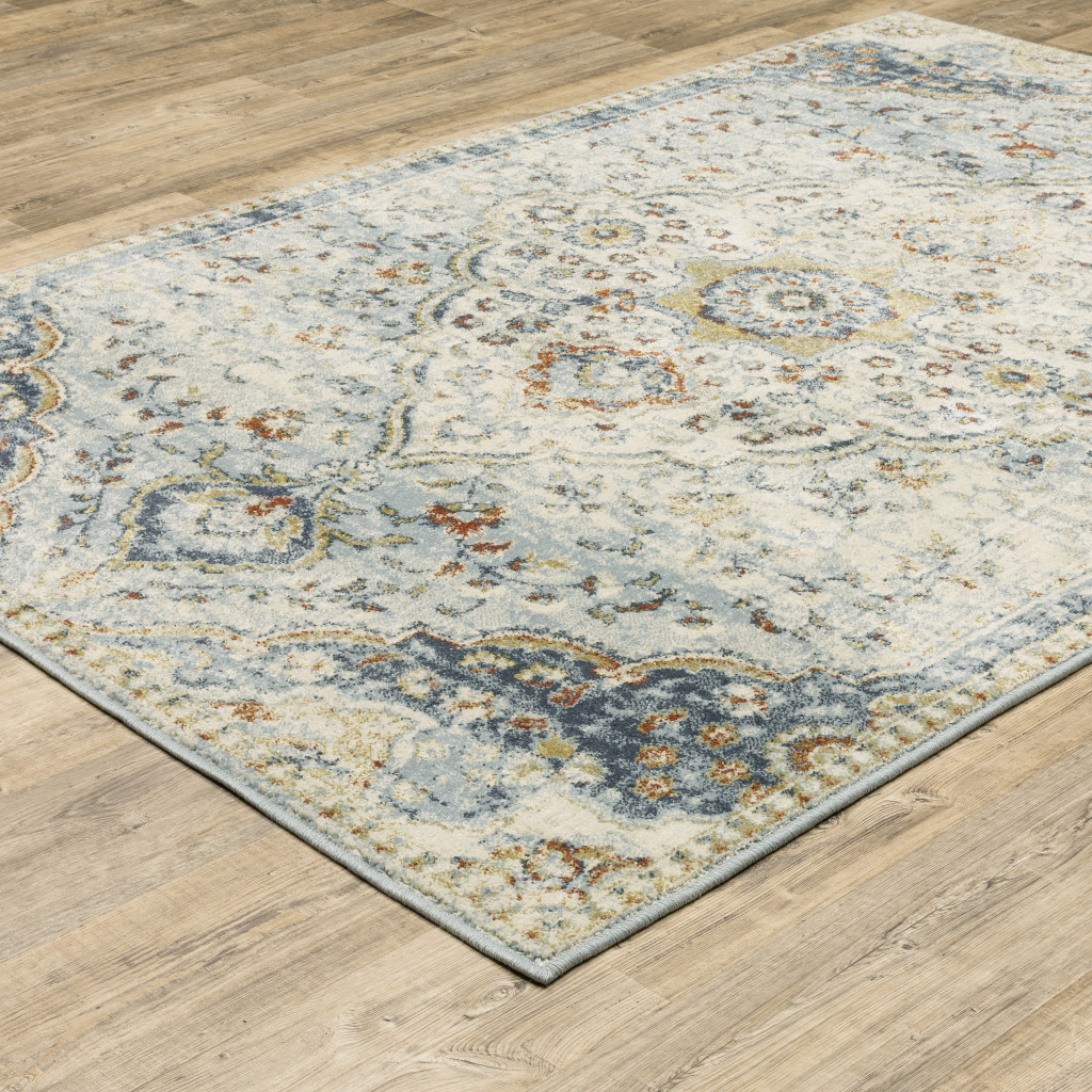 5" X 7" Blue Beige Rust Gold And Teal Oriental Power Loom Stain Resistant Area Rug