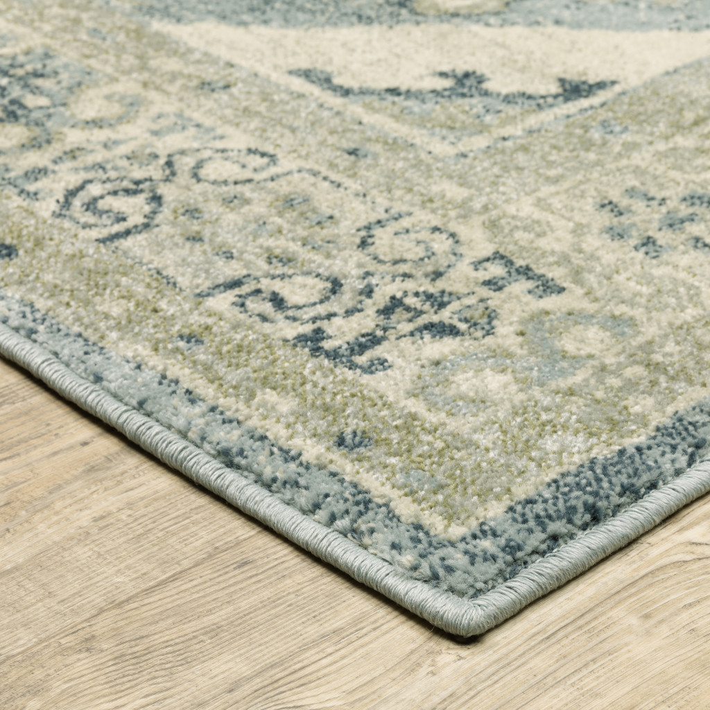 5" X 7" Blue Grey Beige And Teal Oriental Power Loom Stain Resistant Area Rug