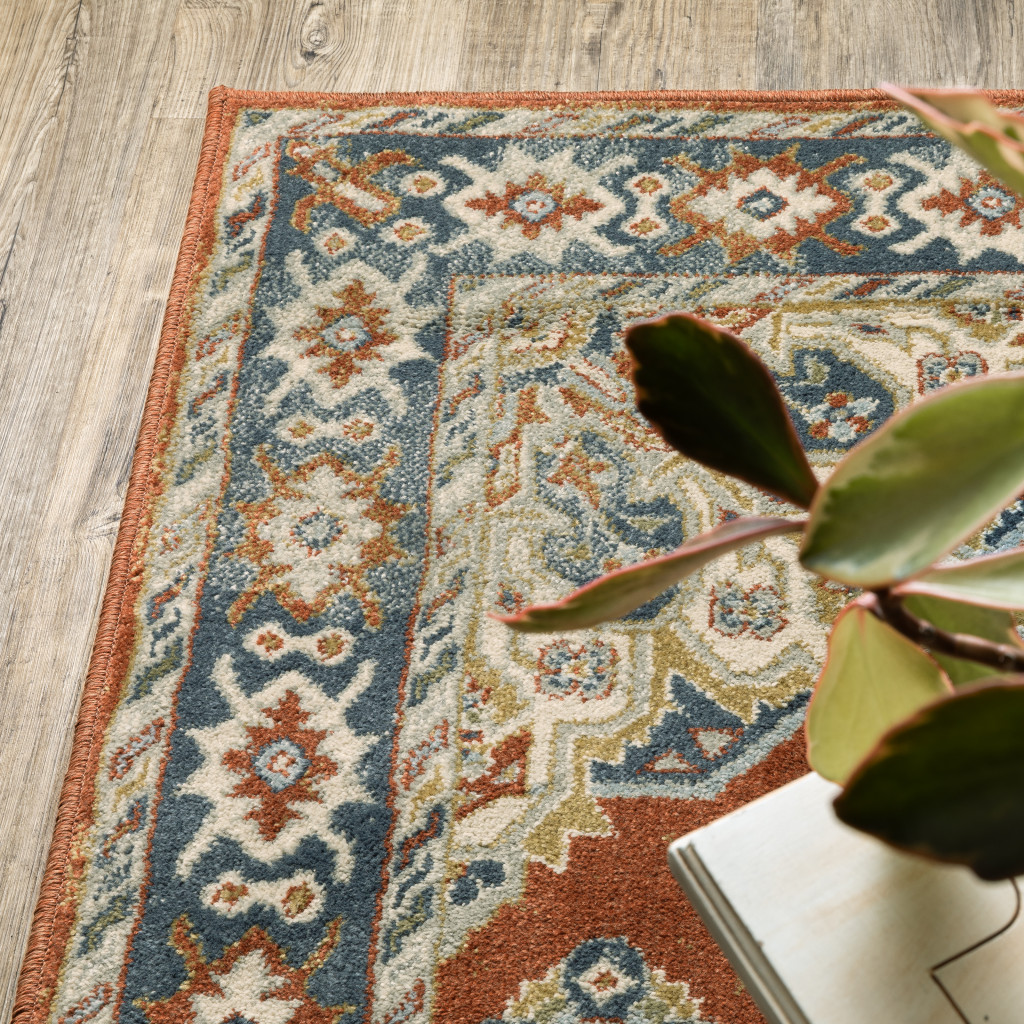 3" X 5" Rust Beige Teal Blue And Gold Oriental Power Loom Stain Resistant Area Rug