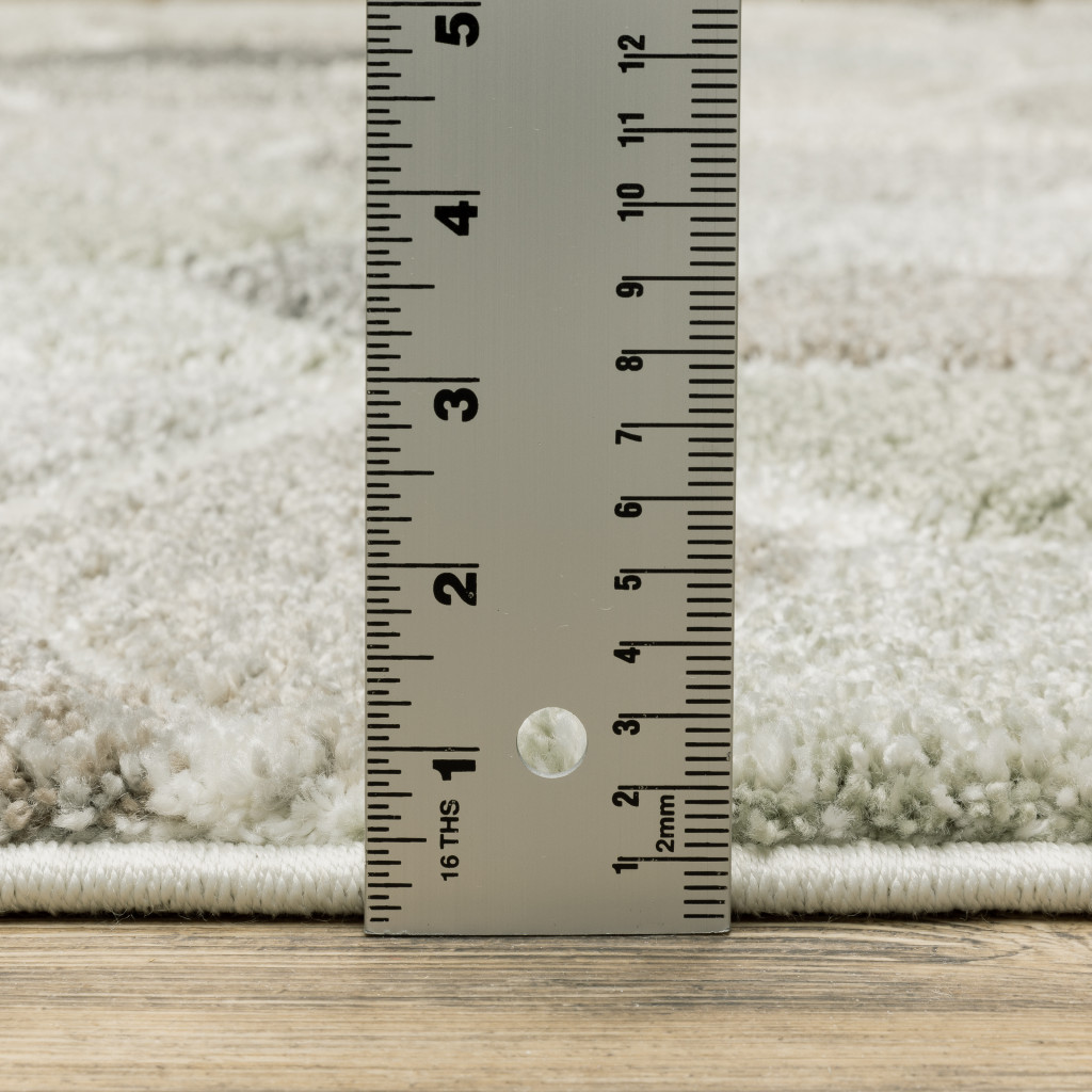 10" X 13" Beige Brown Grey Tan Sage And Pale Blue Geometric Power Loom Stain Resistant Area Rug