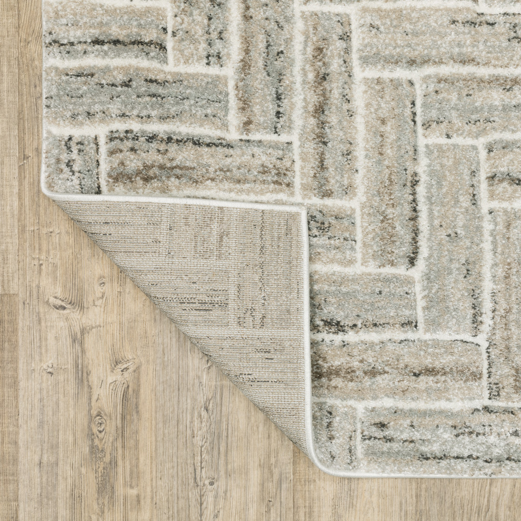 3" X 5" Ivory Beige Grey Brown Pale Blue And Charcoal Geometric Power Loom Stain Resistant Area Rug