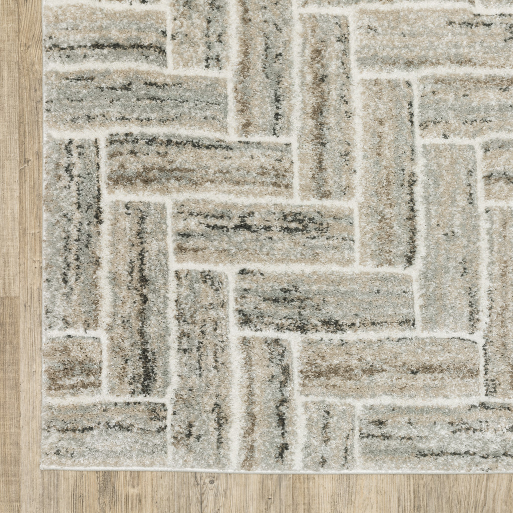 7" X 10" Beige and Ivory Geometric Power Loom Area Rug