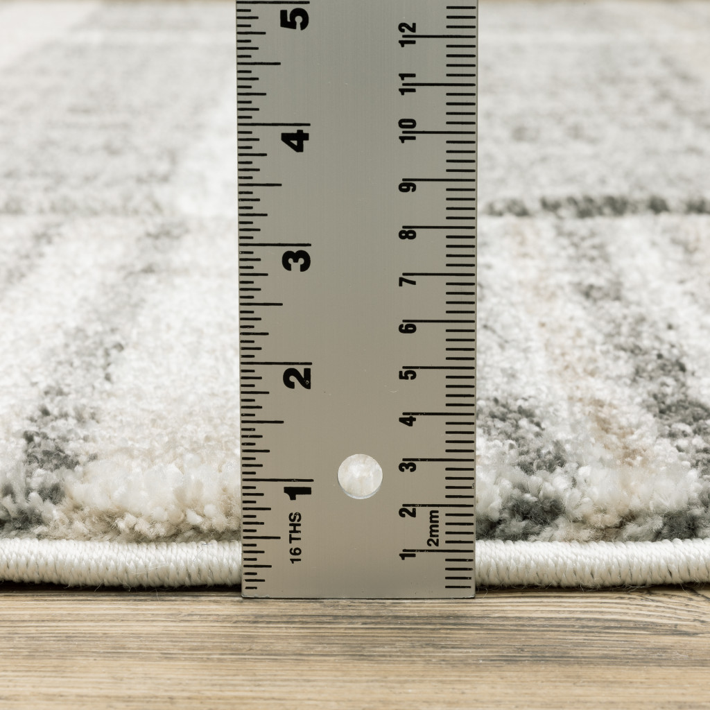 2" X 8" Grey Charcoal Ivory Tan Brown And Beige Geometric Power Loom Stain Resistant Runner Rug