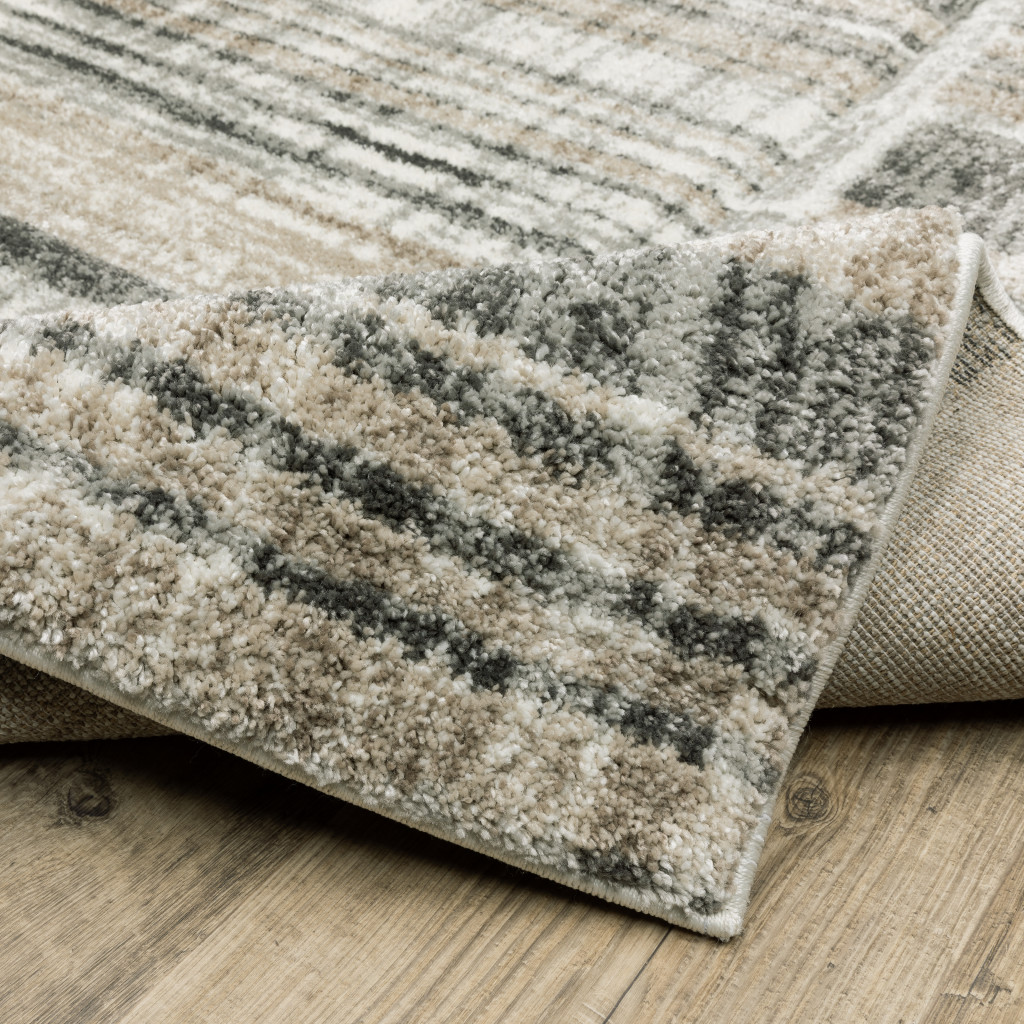 2" X 8" Grey Charcoal Ivory Tan Brown And Beige Geometric Power Loom Stain Resistant Runner Rug