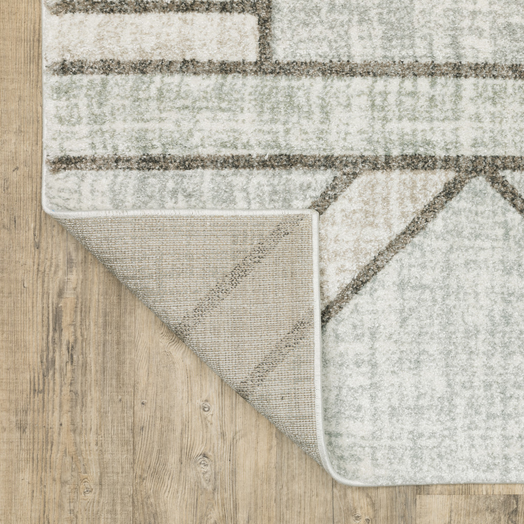 3" X 5" Gray And Ivory Geometric Power Loom Area Rug