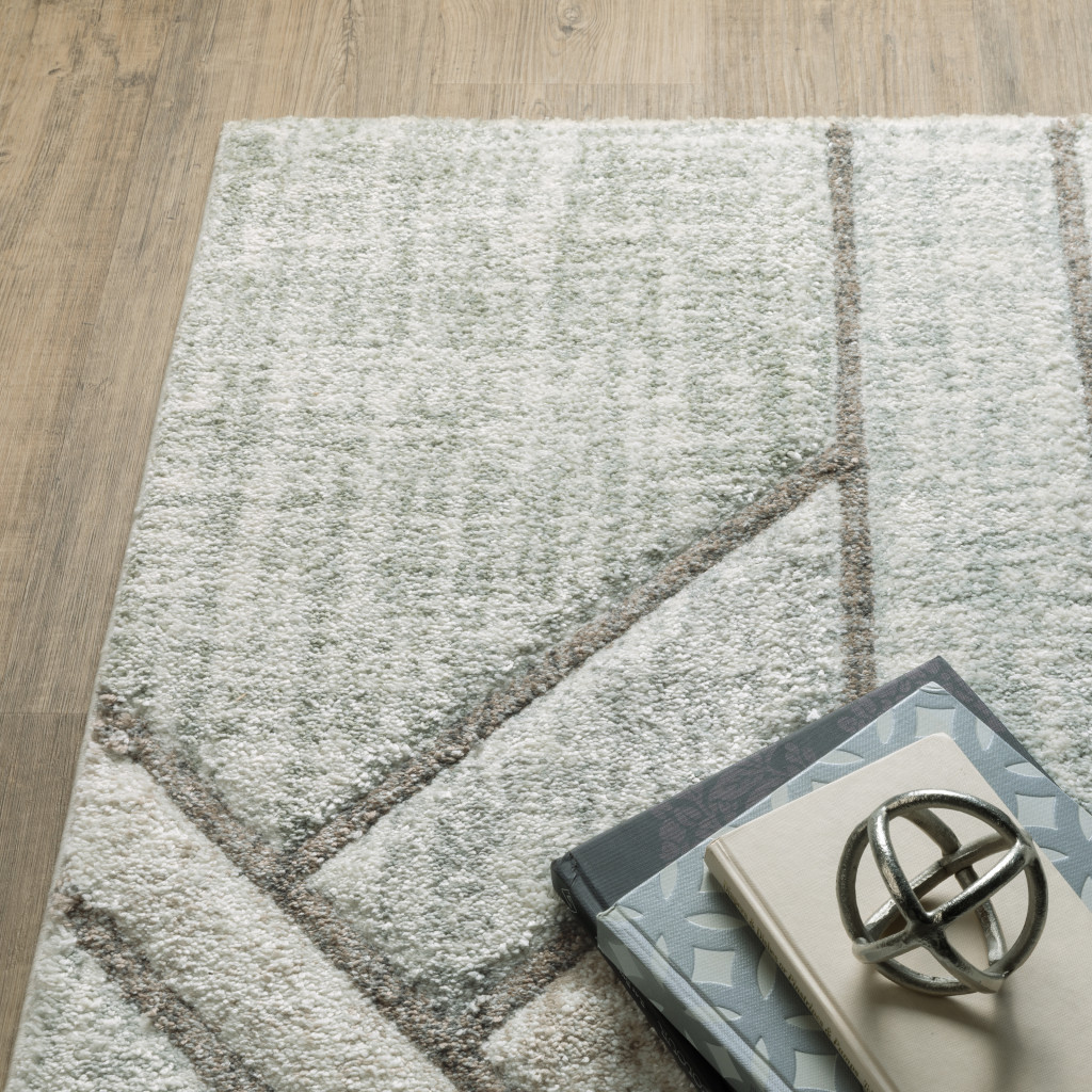 5" X 8" Gray And Ivory Geometric Power Loom Area Rug