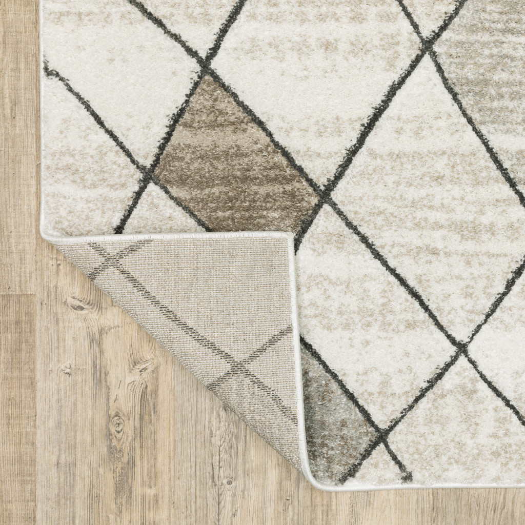 2" X 8" Beige Grey Tan And Brown Geometric Power Loom Stain Resistant Runner Rug