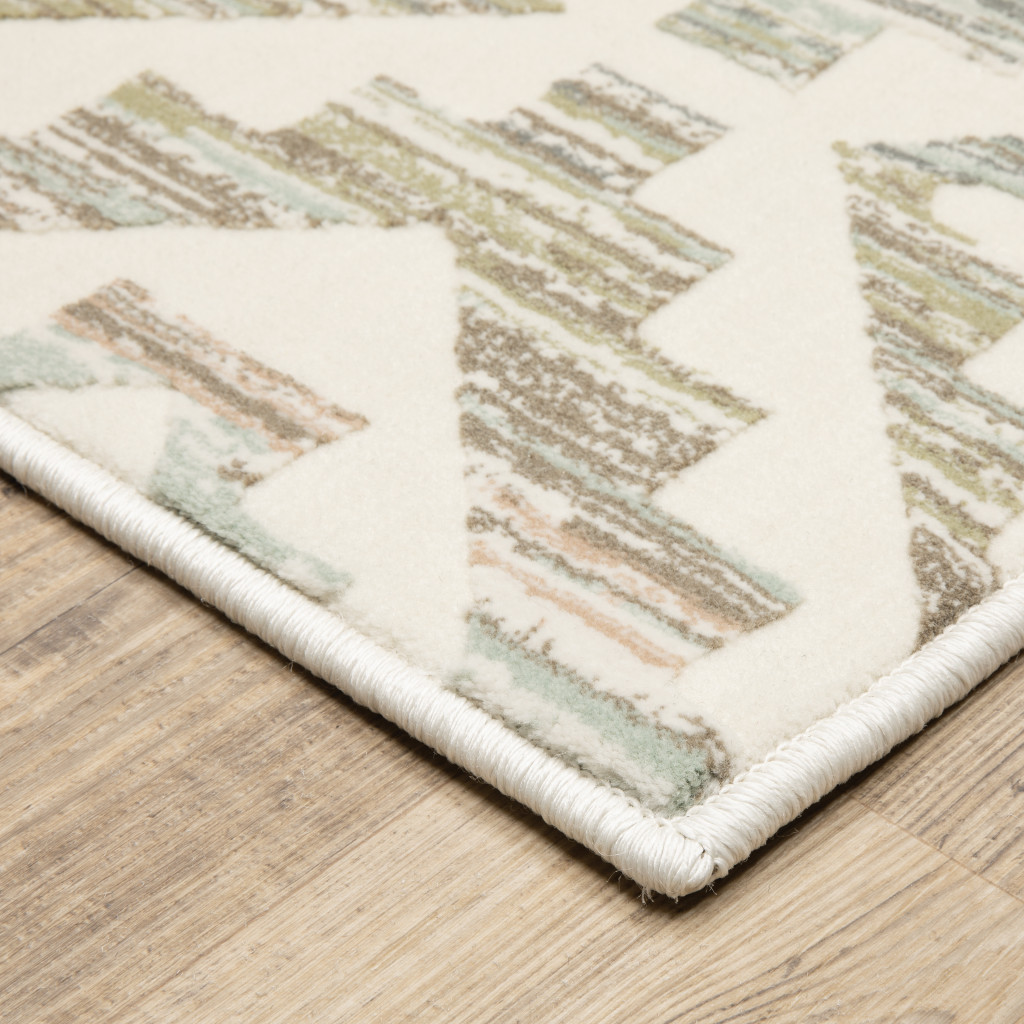10" X 13" Grey Pink And Sage Geometric Power Loom Stain Resistant Area Rug