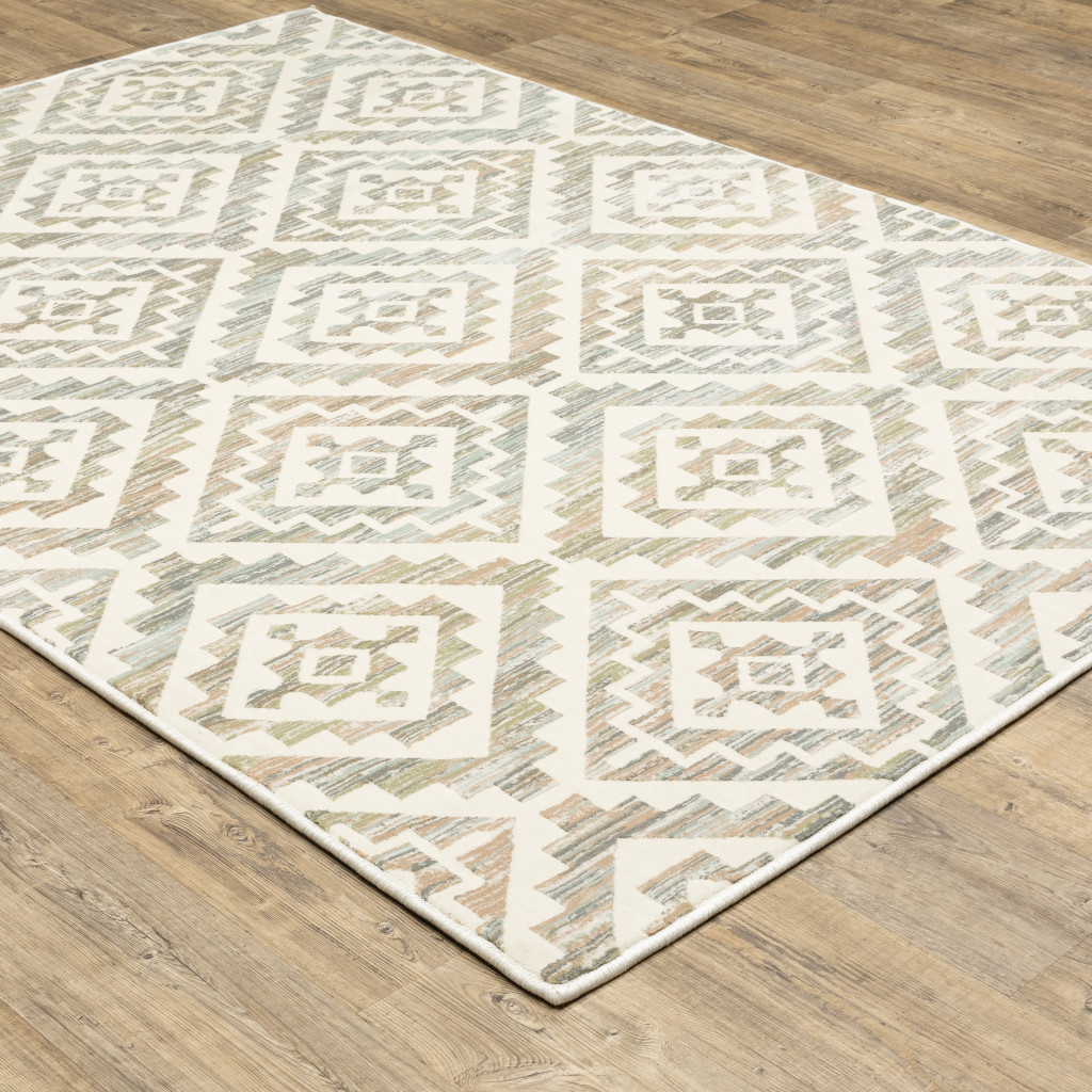 10" X 13" Grey Pink And Sage Geometric Power Loom Stain Resistant Area Rug