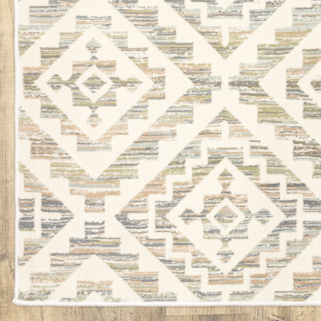 10" X 13" Grey Pink And Sage Geometric Power Loom Stain Resistant Area Rug
