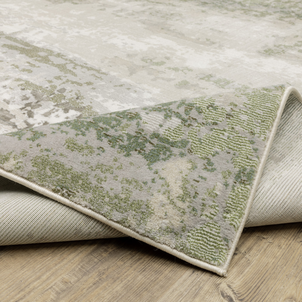 2" X 8" Beige Grey Brown And Sage Green Abstract Power Loom Stain Resistant Runner Rug