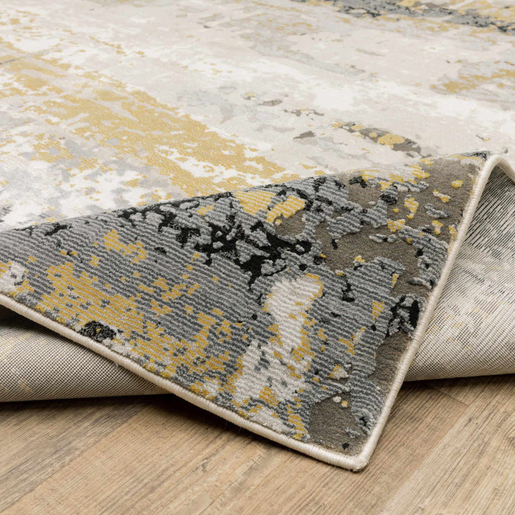 2" X 8" Grey Gold Beige Black And Brown Abstract Power Loom Stain Resistant Runner Rug