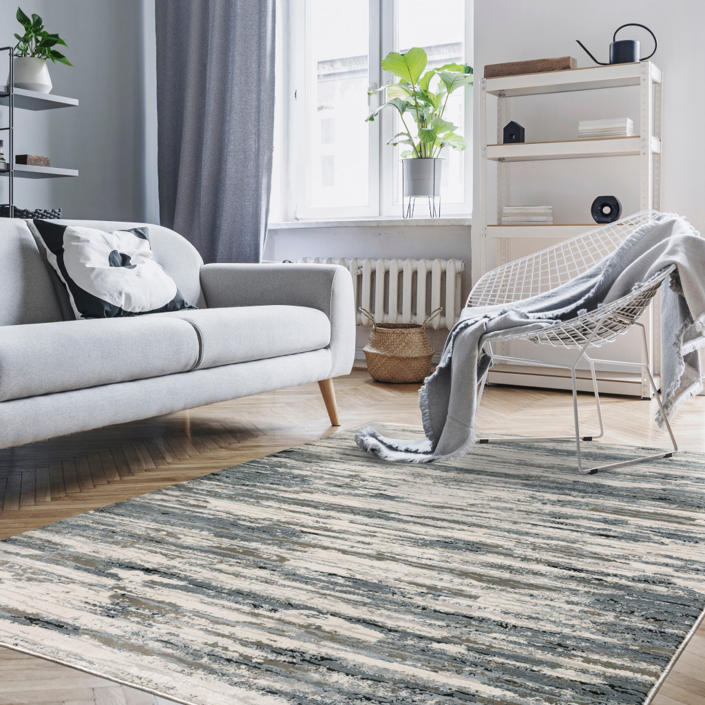 5" X 8" Blue Grey Beige And Brown Abstract Power Loom Stain Resistant Area Rug