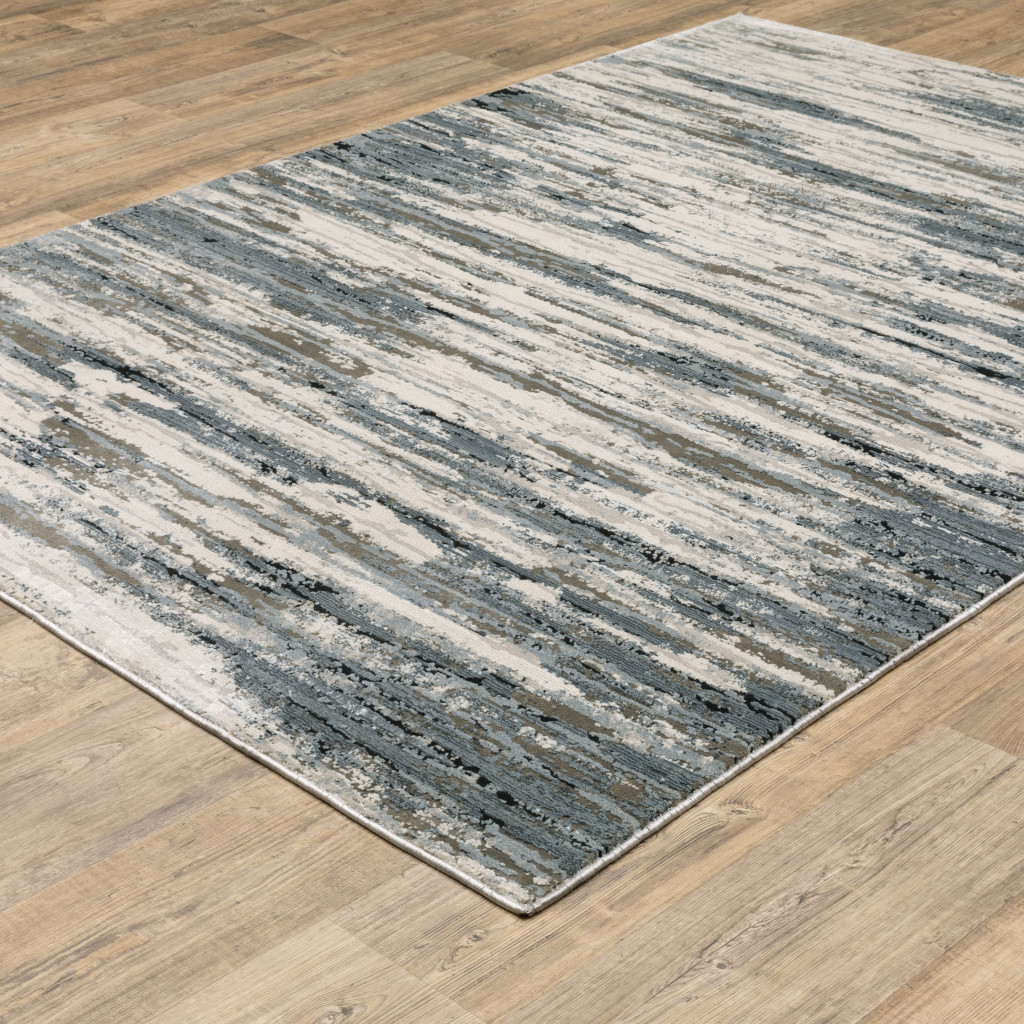 8" X 11" Blue Grey Beige And Brown Abstract Power Loom Stain Resistant Area Rug