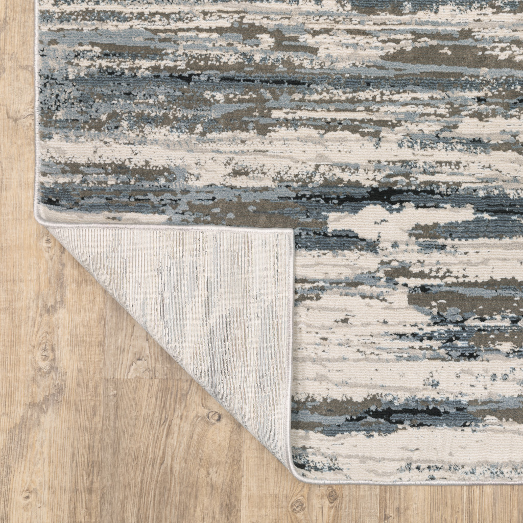 10" X 13" Blue Grey Beige And Brown Abstract Power Loom Stain Resistant Area Rug