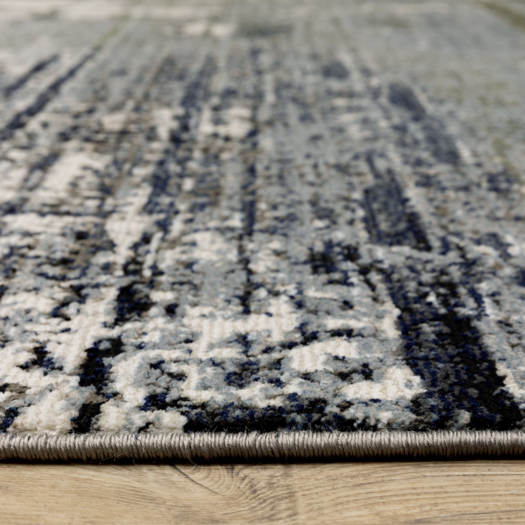 6" X 9" Blue And Green Abstract Power Loom Area Rug