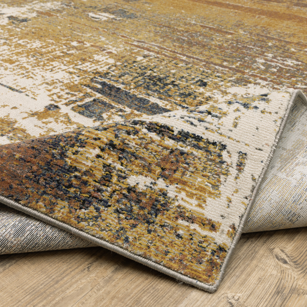 2" X 8" Gold Brown Rust Grey Blue And Beige Abstract Power Loom Stain Resistant Runner Rug