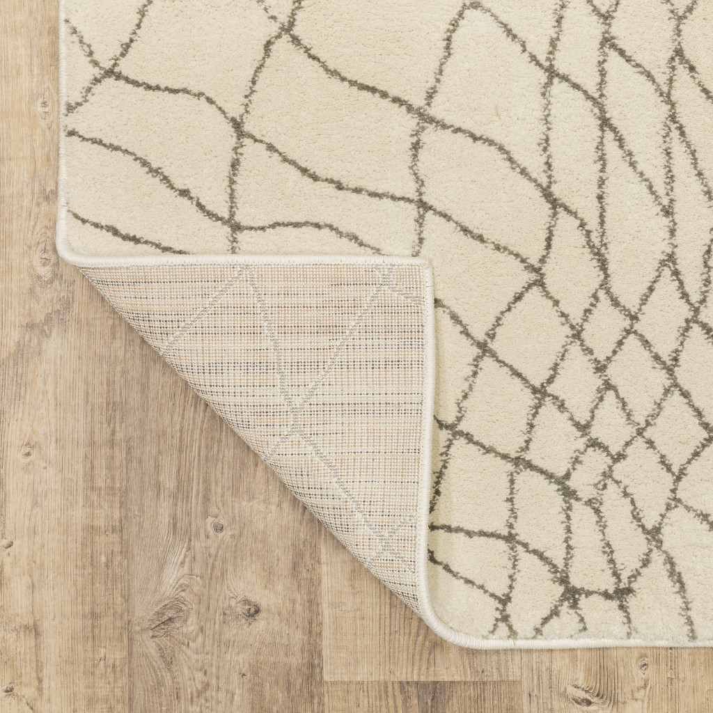 2" X 8" Ivory And Grey Geometric Power Loom Stain Resistant Runner Rug