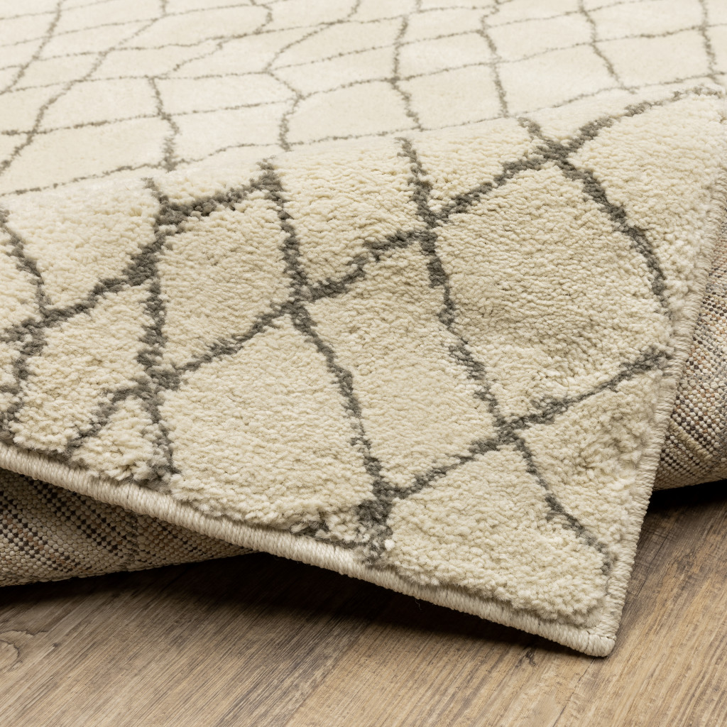 2" X 8" Ivory And Grey Geometric Power Loom Stain Resistant Runner Rug