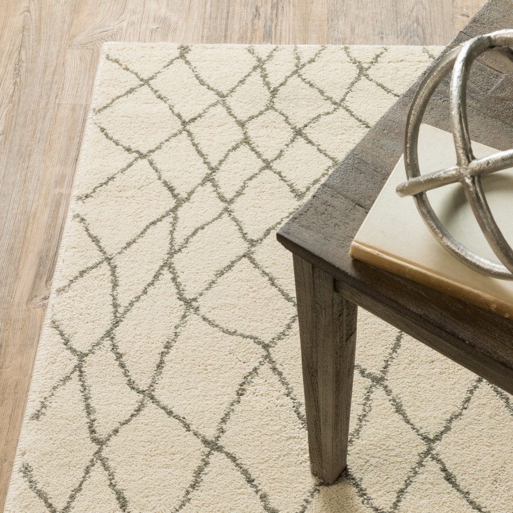 5" X 7" Ivory And Grey Geometric Power Loom Stain Resistant Area Rug