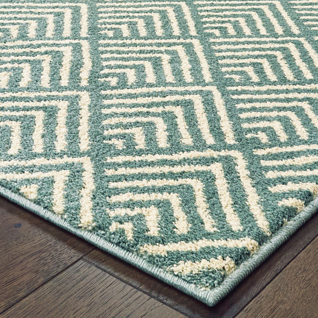 5 X 7 Foam Blue And Ivory geometric Power Loom Stain Resistant Area Rug