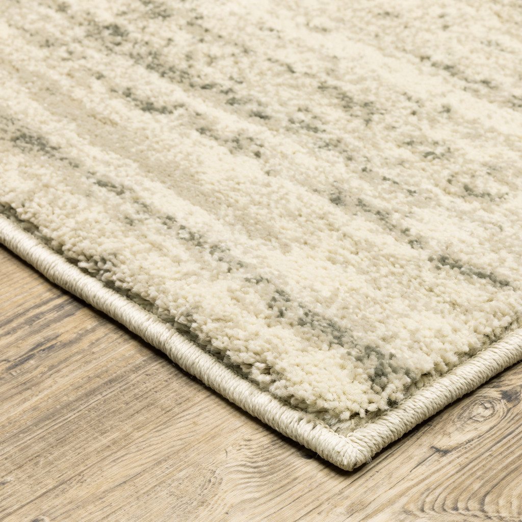 2 X 3 Beige And grey Abstract Power Loom Stain Resistant Area Rug