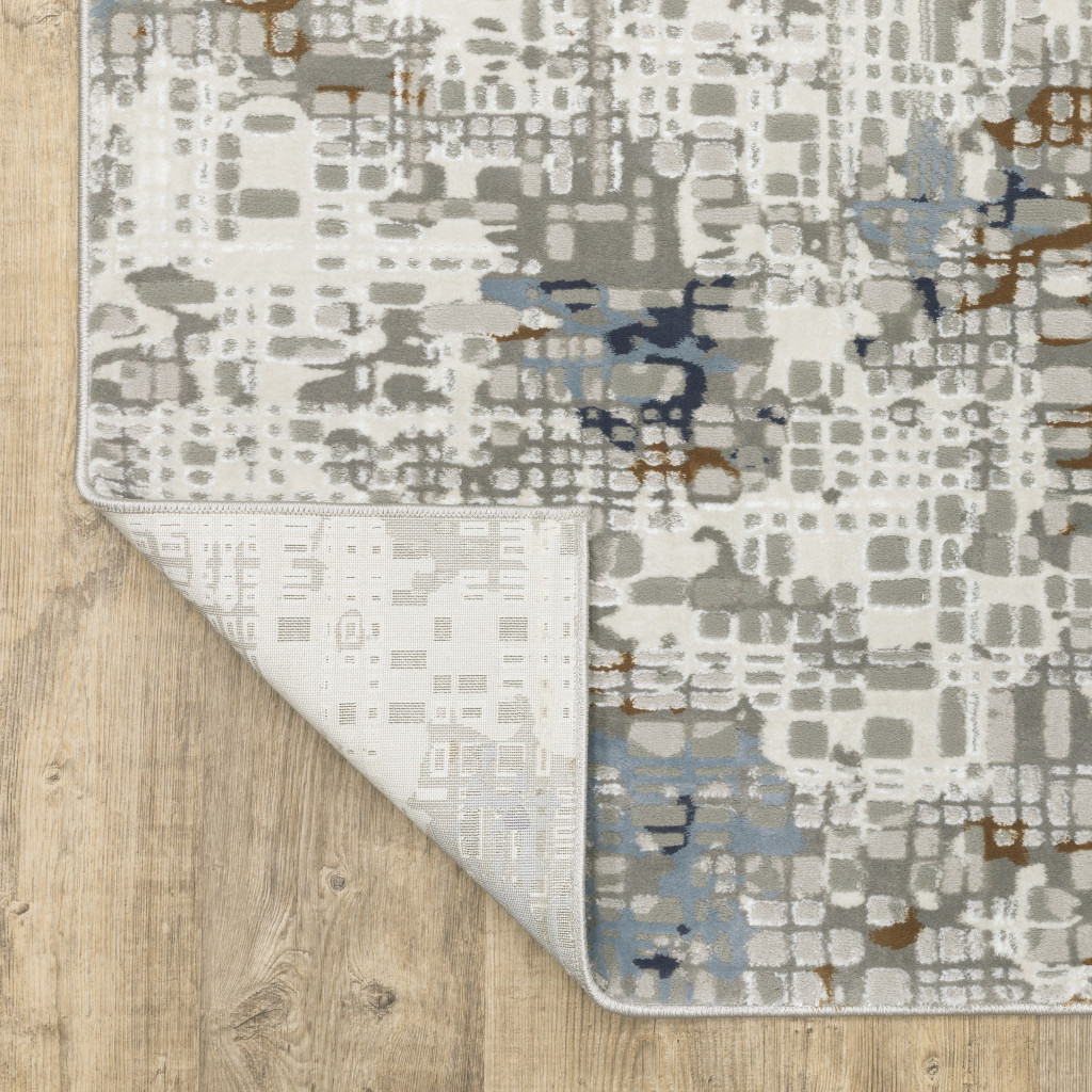 3" X 5" Blue Ivory Grey Brown Beige And Light Blue Abstract Power Loom Stain Resistant Area Rug