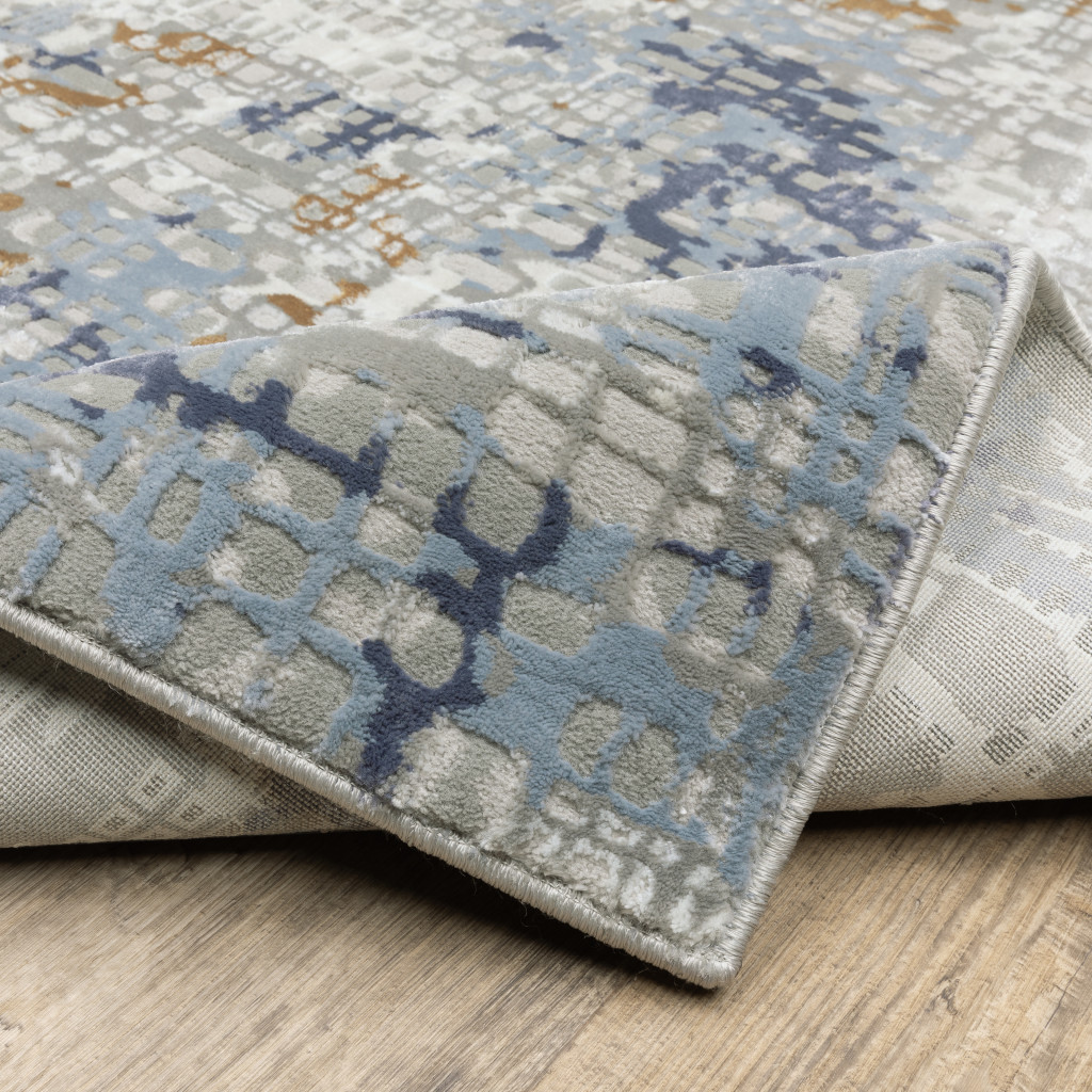 3" X 5" Blue Ivory Grey Brown Beige And Light Blue Abstract Power Loom Stain Resistant Area Rug