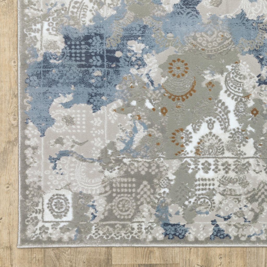 10" X 13" Grey Blue Ivory Navy Beige And Brown Abstract Power Loom Stain Resistant Area Rug