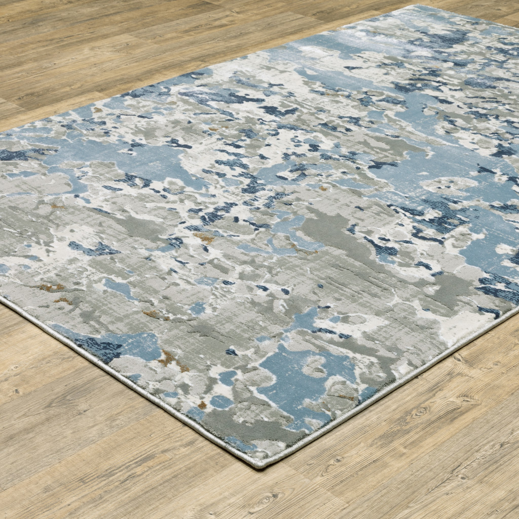 5" X 8" Grey Blue Ivory Navy Beige And Brown Abstract Power Loom Stain Resistant Area Rug