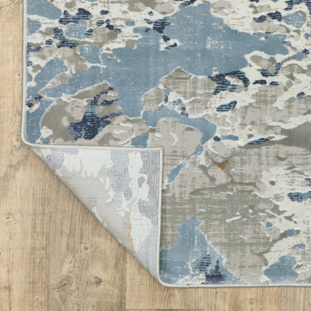5" X 8" Grey Blue Ivory Navy Beige And Brown Abstract Power Loom Stain Resistant Area Rug