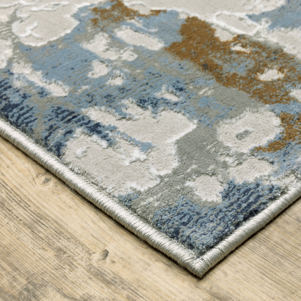 6" X 9" Grey Blue Navy Ivory And Brown Abstract Power Loom Stain Resistant Area Rug