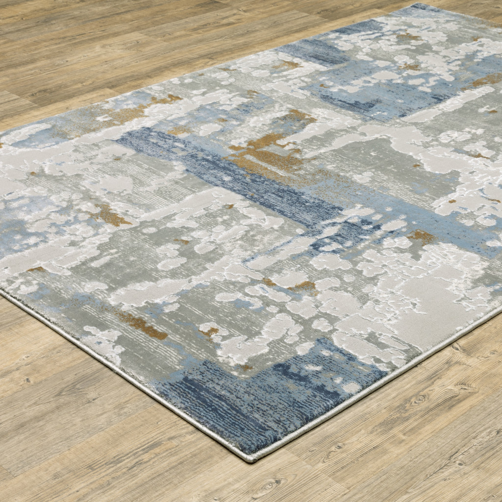 6" X 9" Grey Blue Navy Ivory And Brown Abstract Power Loom Stain Resistant Area Rug