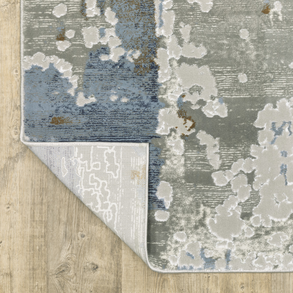6" X 9" Grey Blue Navy Ivory And Brown Abstract Power Loom Stain Resistant Area Rug