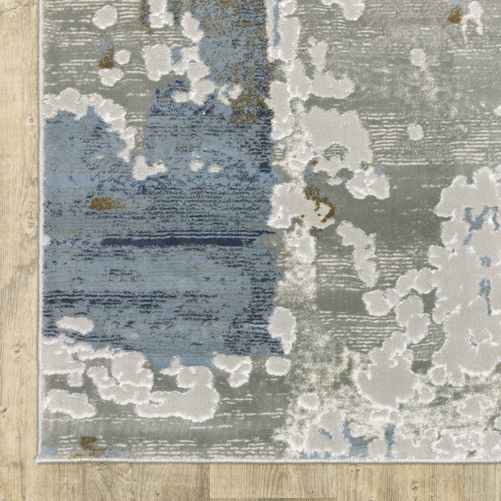 6" X 9" Grey Blue Navy Ivory And Brown Abstract Power Loom Stain Resistant Area Rug